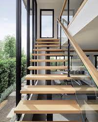 Stairway To Heaven What A Striking Staircase And Window Combo The Use Of Harsh Black Against Natural Oak Ti Staircase Design Loft House Design Stairs Design