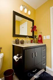 Yellow bathroom vanity lights : The One Week Bath Team Designed This Contemporary Style Yellow Bathroom With Flutex Shower Door T Yellow Bathroom Walls Yellow Bathrooms Yellow Bathroom Decor