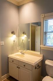 It's got an unusual design of wall tile. Small Bathroom Remodel Before And After Pink Bathroom Design Ideas
