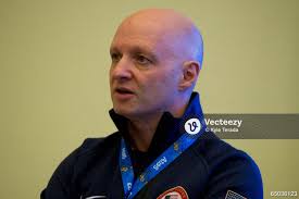 USA Curling team leader Derek Brown addresses the media in the USA Women's  Curling press conference during the Sochi 2014 Olympic Winter Games at Main  Press Center. 65036123 Editorial Image