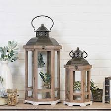 The features of the six sided lantern include an antique copper finish and easy access from the top. Wooden Hexagon Lanterns With Metal Tops Set Of 2 Kirklands