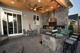 Small outdoor kitchen with bar seating. 50 Enviable Outdoor Kitchens For Every Yard