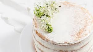 Combine the flour, baking soda and baking powder, add to the creamed mixture and mix until all of the flour is absorbed. Simple Vanilla Naked Cake Recipe With Buttercream Frosting