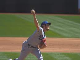Trevor bauer sits on a folding chair in a drafty warehouse, sipping applesauce from a plastic cup and electrocuting his brain. Vzsnp0qltb6khm