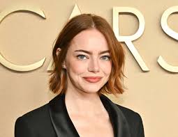 Emma Stone's Bold Office Siren-Coded Mini LBD Plunges All the Way Down to Her Stomach