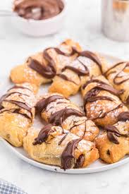 Roll up each loosely, starting at shortest side of triangle, rolling to opposite point. Air Fryer Chocolate Croissants Simply Stacie
