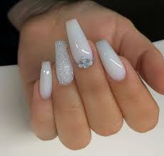 Out of all the acrylic choices, the traditional pink and white design continues to reign supreme. Milky White Bling Crystal Luxury Press On Nails Slaylebrity