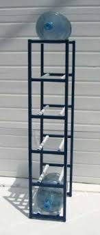 You can get the coleman 5 gallon jug here. 6 Bottle Vertical Water Bottle Storage Rack Black Black 50 H X 13 W X 21 D By Sha Co 311 00 Small F Bottle Storage Rack Rack Design Appliances Storage