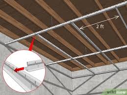 Drop ceilings are an easy solution to ugly pipes, wiring and other ceiling issues, but aging ceiling tiles can become discolored and stained. How To Install A Drop Ceiling 14 Steps With Pictures Wikihow