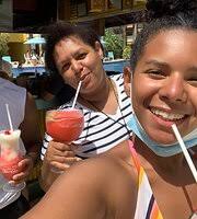 Enjoying some delicious drinks at La Palapa Beach Bar Infinty Bay Roatan  Honduras. Virgen Miami Vice , Strawberry Daiquiri