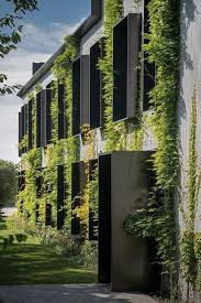 Cool 45 Superb Vertical Garden Design Ideas For Green And Cool House Especially In Cities Or Apartment Green Building Design Green Facade Green Architecture