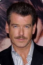 Pierce brosnan has revealed his new look to the world, consisting of big bushy beard and scraggly locks as he makes grooming and hair cuts a thing of the past. Pierce Brosnan Mustache Men Pierce Brosnan Beard No Mustache