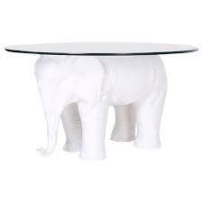 Round transparent glass top is recommended for this coffee table. Midcentury Ceramic White Elephant Table At 1stdibs