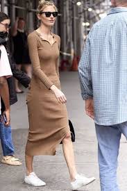 Martha Hunt Steps Out In New York City Wearing A Toteme Arezzo Ribbed Knit Midi Dress Ray Ban Rb2140 Original W Ribbed Knit Dress Street Style Dress Knit Midi