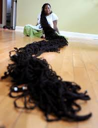 Woman With Longest Dreadlocks In The World Hair Could Potential Paralyze Natural Hair Rules Long Dreads Natural Hair Styles Natural Hair Rules