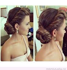 This side bun is full of curls creating an amazing style. Amazing Side Bun And Earrings For Wedding Hair Styles Elegant Hairstyles Wedding Bun Hairstyles