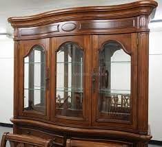 Yes, i've been dreaming of slipcovers. Lot 9 Piece Chris Madden Dining Room Set Table With 6 Chairs And 2 Leaves China Cabinet With A Lighted Interior Mirrored Back And Glass Shelves And A Server With An