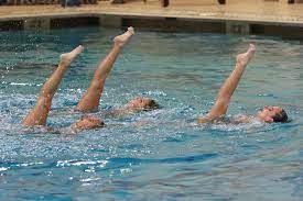 Nicole and camille are synchronized swimmers