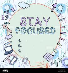 Hand writing sign Stay Focused, Word for Be attentive Concentrate Prioritize the task Avoid distractions Stock Photo - Alamy