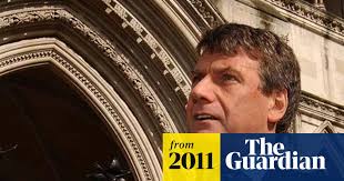 Arrested ex-News of the World executive Neil Wallis worked for Met