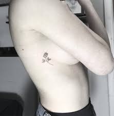 Flower rib tattoo small ink @raymond_brekke11. Fine Line Rose Tattoo On The Right Side Ribcage