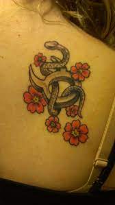 Taurus Tattoo Someday This Will Be My Final Tattoo But No Flowers With The Snake Outlined In Green And The S Tattoos Taurus Tattoos Inspirational Tattoos