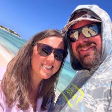 Antique white siding with black shingles and chi accents?