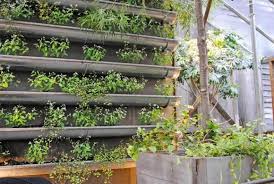 25 Beautiful Vertical Garden Design Ideas Vertical Garden Design Vertical Vegetable Gardens Gutter Garden