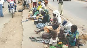 Image result for pictures of beggars and street hawkers in Nigeria