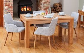 Find modern dining room chairs as dashing as the table itself. Baumhaus Mobel Oak Dining Table And 4 Light Grey Fabric Dining Chairs Cfs Furniture Uk