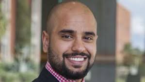 UA graduates receiving outstanding achievement awards