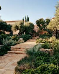 20 Captivating Designer Gardens You Ll Swear Are Enchanted Mediterranean Landscaping Mediterranean Landscape Design Tuscan Style Garden