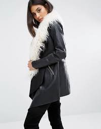 Rejuvenate classic wardrobe favourites with a relaxed fit waterfall coat, or mix it up with a colourful draped cape. River Island Waterfall Coat With Faux Fur Collar Asos