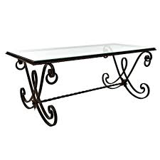 With its curving silhouette and mixed media look, this coffee table is an artful accent that doesn't skimp on function. Wrought Iron Coffee Table You Ll Love In 2021 Visualhunt