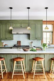 The kitchen has a perfectly charming colour tone. Green Craftsman Kitchen Design Transitional Kitchen