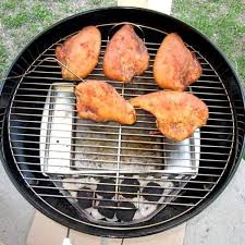 How to charcoal grill bone in chicken breast. Tasty Grill Smoked Chicken Cooked Over Charcoal In A Weber Grill