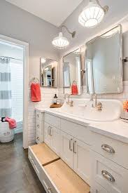 A blank wall gets a pretty and useful makeover with the addition of beadboard, wall art and hooks. 57 Kids Bathrooms Ideas Bathroom Kids Kids Bathroom Kids Toilet