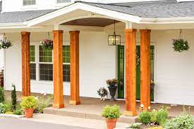 There is nothing wrong with using cedar support posts. Adding Cedar Pillars To Our Dream House Wood Columns Porch Front Porch Posts Front Porch Columns