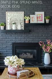 While there are countless ways to decorate the wall above the fireplace, inexpensive fireplace wall decorating ideas can be difficult. Simple Pink Spring Mantel Decor The Happy Housie