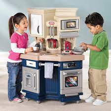 A lot of adorable little tikes dollhouse furniture, including: Super Chef Kitchen Little Tikes