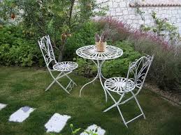 White Wrought Iron Table And Chairs For The Garden Wrought Iron Table Iron Table Outdoor Furniture Sets