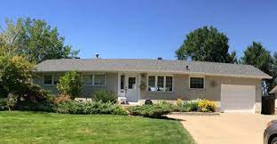 Toward the front of the beds, plant shrubs that remain small and have a rounded growing habit, or tolerate heavy pruning to make them round. Any Suggestions For More Curb Appeal For Low Roof Ranch Style Home