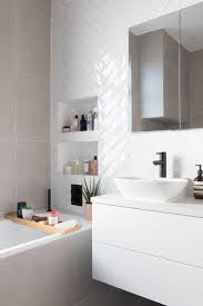 White Glossy Tiles Bathroom In 2020 White Tile Bathroom Walls Bathroom Wall Tile Design White Bathroom Designs