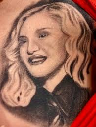 Topeka woman breaks tattoo world record