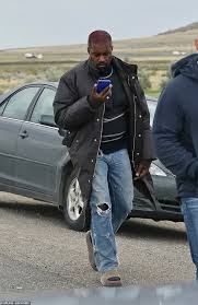 Kanye, yeezus, kanye omari west, mr. Kanye West Looks Distracted As He Leaves Wyoming Compound In A Weighted Vest Amid Bipolar Episode Daily Mail Online