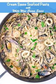 Low carb roasted garlic cream sauce low carb delish. Cream Sauce Seafood Pasta Creamy White Wine Sauce That Spicy Chick