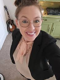 Can someone edit this photo to make it a professional headshot?