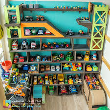 By pushing the button you can direct the elevator to lift the car to one of 10 parking spaces. Toy Car Display Garage Free Sketches In Pdf Toy Car Garage Toy Car Display Toy Car Storage