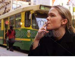 Samantha Parker 20 Of Melbourne Puffs On Her Afternoon Tea Break Cigarette Near A City Tram In Central Melbourne On World No Tobacco Day May 31 Australia S Minister For Health Says He Supports