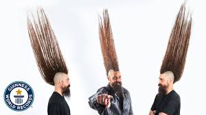 To help boys with long hair, their parents, outsiders, and the rest of the world see that it's ok to be different. Tallest Mohawk Guinness World Records Youtube